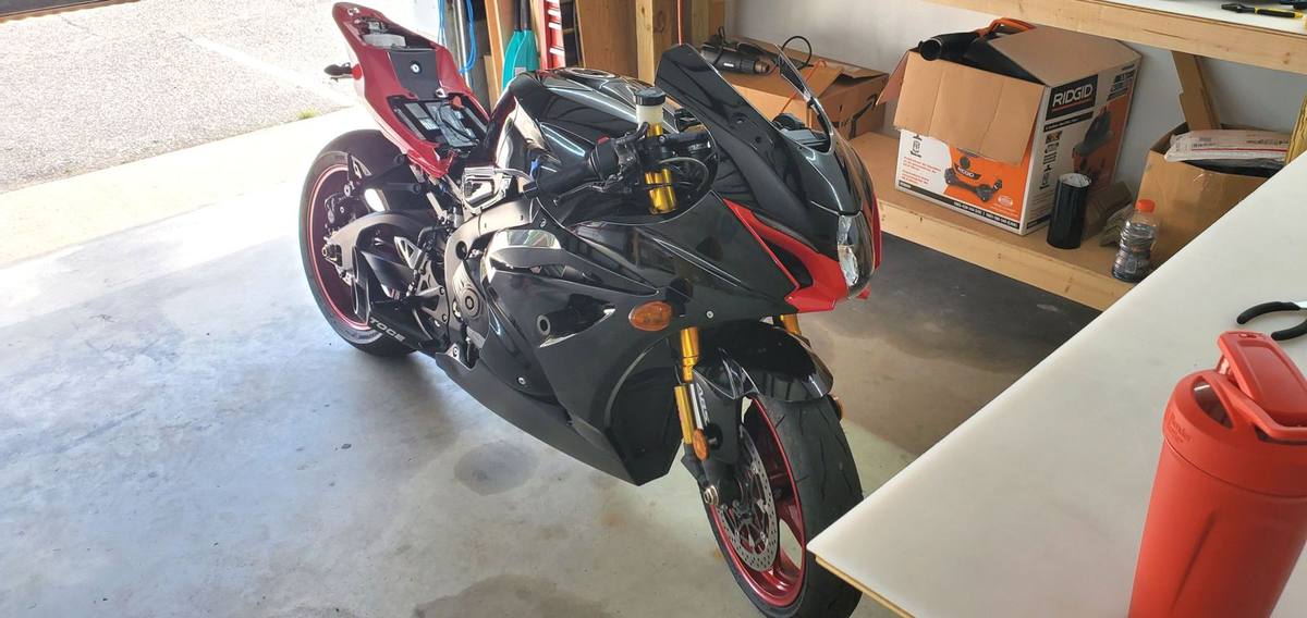 Suzuki sport bike in stock black and red before wrap